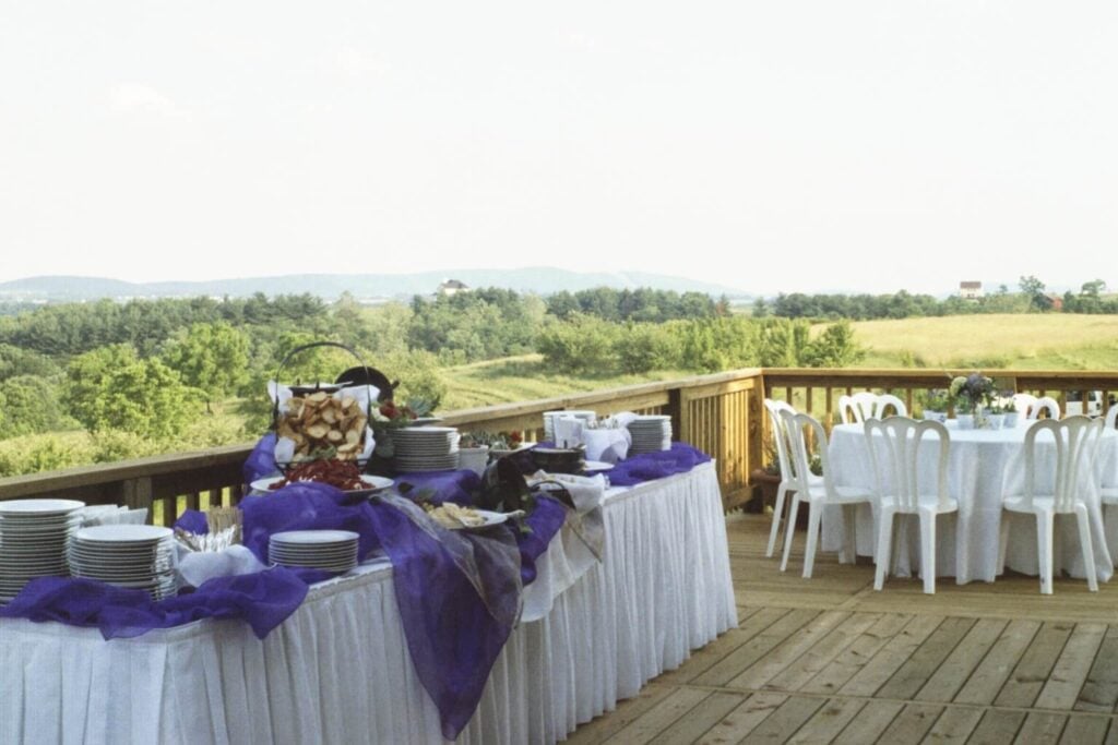 Catering set-up for a formal buffet on the deck at Willow Oaks craft cider.